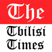 T Times logo
